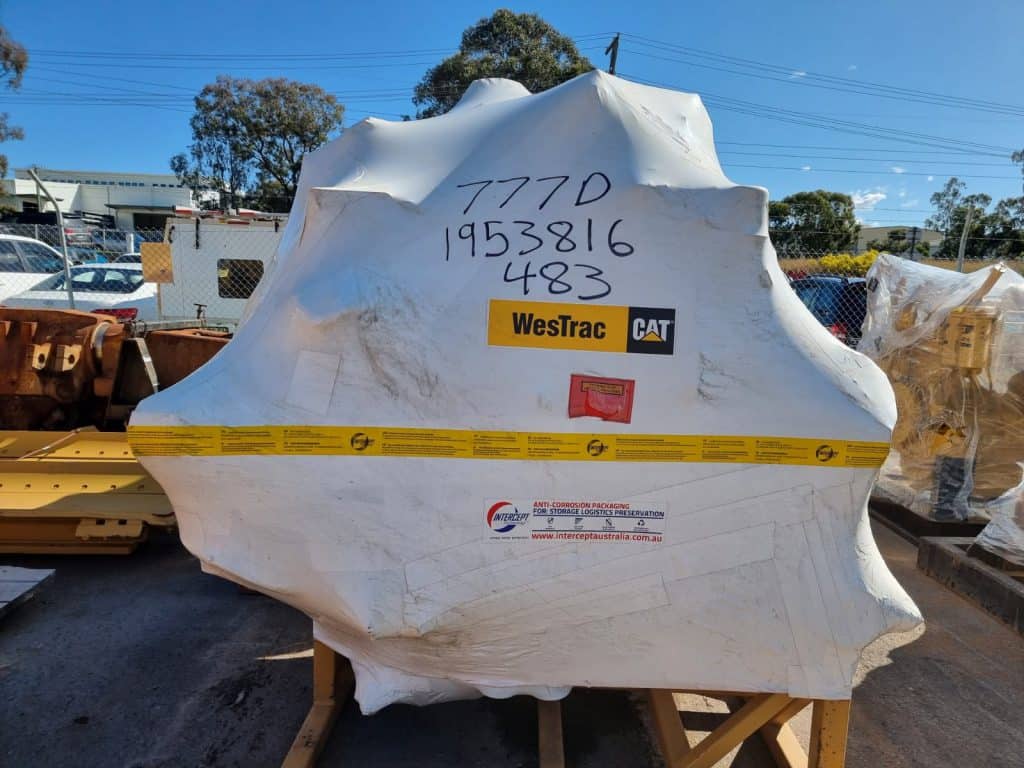 Heavy-duty 777D engine cover for Caterpillar machinery, with FlexiParts branding.