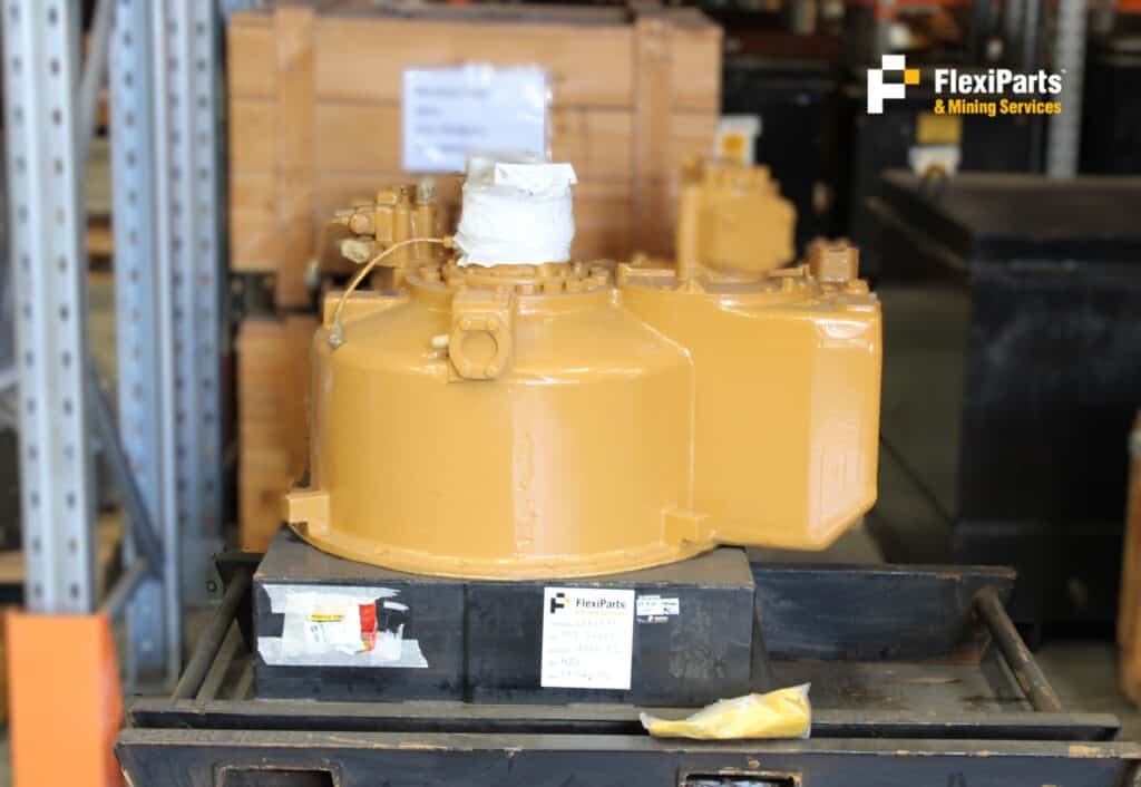Rebuilt 994H torque converter and housing for heavy machinery. Quality parts available at FlexiParts.
